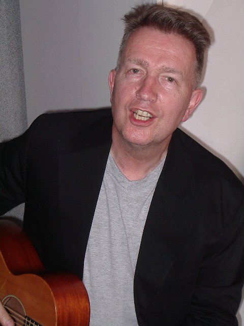 Tom Robinson, 6/11/04, photo by JD Doyle